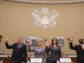From left, Undersecretary of State for Management Patrick Kennedy; State Department Transparency Coordinator Janice Jacobs; Executive Secretariat Director Karin Lang and Correspondence, Records, and Staffing Division Deputy Director Clarence Finney, Jr. are sworn in on Capitol Hill in Washington, Thursday, Sept. 8, 2016, prior to testifying before the House Oversight Government Reform Committee hearing on 'Examining FOIA Compliance at the Department of State.' (AP Photo/Molly Riley)