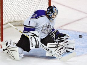Los Angeles Kings goalie Sean Burke stops a shot during NHL action against the Vancouver Canucks at GM Place in this file photo from 2007. (Postmedia Network file photo)