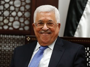 Palestinian President Mahmoud Abbas smiles during a meeting with the Norwegian foreign minister in the West Bank city of Ramallah on Sept. 8, 2016. (ABBAS MOMANI/AFP/Getty Images)