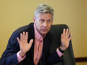 In this May 18, 2016 file photo, Libertarian presidential candidate, former New Mexico Gov. Gary Johnson speaks with legislators at the Utah State Capitol in Salt Lake City. The day after political heavyweight Mitt Romney name-dropped him on Twitter, the former New Mexico governor seemed to reveal a hole in his foreign-affairs knowledge when he was befuddled by an otherwise routine question about the Syrian city of Aleppo. (AP Photo/Rick Bowmer, File)