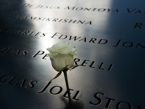 A rose stands in an engraved name on the parapet of the 9/11 Memorial on the 23rd Anniversary of the World Trade Center bombing on February 26, 2016 in New York, NY. The 1993 bombing of the World Trade Center was the first act of terrorism at the World Trade Center and resulted in 6 deaths and over 1,000 injuries. (Photo by Bryan Thomas/Getty Images)