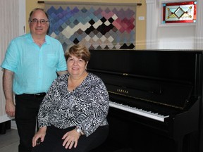 Board chair N. Leonard Segall and and his wife Marilyn Mason are pictured here with the Yamaha piano they recently donated to the Lawrence House Centre for the Arts. The centre is hosting its first Tunes for the Turret pianothon next month to celebrate the donation. (Barbara Simpson/Sarnia Observer)