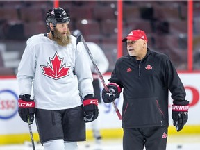 Joe Thornton talks with coach Barry Trotz as Team Canada practices at the Canadian Tire Centre on Sept. 6, 2016 in preparation for the World Cup of Hockey. (Wayne Cuddington/Postmedia Network)