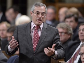 File photo: Tony Clement answers a question during Question Period in the House of Commons in Ottawa on Tuesday, May 26, 2015. THE CANADIAN PRESS/Adrian Wyld  Clement
Adrian Wyld