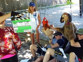 Haley Schlotzhauer (left) takes part in a video short with puppeteers Andy Hayward, Frank Meschkuleit and (hidden) Gord Robertson. (Photo submitted)