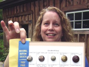 Joanne Irons and her prize-winning collection of Canadian military buttons from the National Button Society's international show and sale. "I didn't want an American to win this award," the veteran collector laughs.