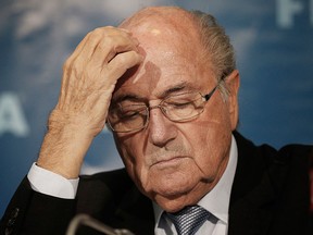 In this Dec. 19, 2014 file photo then FIFA President Sepp Blatter attends a news conference in Marrakech, Morocco. (AP Photo/Christophe Ena, File)