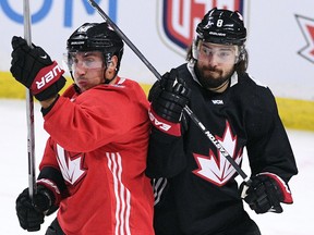 Team Canada’s Brad Marchand, left, and Drew Doughty practice in Ottawa on Wednesday, Sept. 7, 2016. (THE CANADIAN PRESS/Sean Kilpatrick)