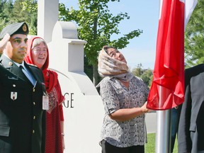A flag-raising ceremony, part of a campaign to raise a Canadian flag in front of mosques across the country ahead of Canada’s 150th birthday, was  held at Jaffari Community Centre on Friday, Sept. 9. (Veronica Henri/Toronto Sun)