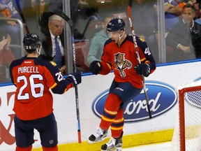 Florida Panthers centre and St. Thomas native Greg McKegg, right, celebrates his first NHL goal against the Toronto Maple Leafs with teammate Teddy Purcell.