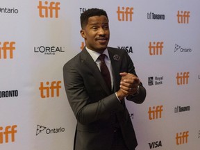 Director Nate Parker arrives on the red carpet for the film "Birth of a Nation" during the 2016 Toronto International Film Festival in Toronto on Friday, September 9, 2016. THE CANADIAN PRESS/Chris Young