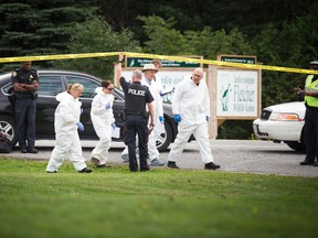 Ottawa police are investigating after a body was found in a parking lot of the Experimental Farm, Sept. 10, 2016. (Ashley Fraser, Postmedia News)