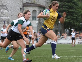 Queen’s Gael Nadia Popov gathers her first try of the game against Trent University on Nixon Field in Kingston on Saturday, September 10, 2016. Queen’s defeated Trent 71-5. Steph Crosier, Kingston Whig-Standard, Postmedia Network
