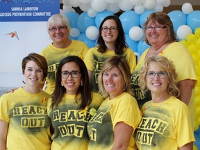 The Sarnia Lambton Suicide Prevention Committee hosted an event inside Lambton Mall to mark World Suicide Prevention Day on Saturday, Sept. 10, 2016 in Sarnia, Ont. Back row from left are committee members Sharon Berry Ross, Kassie Maxwell and Linda Zoccano. Front row from left are Ellie Fraser, Rachael Simon, Liz Page and Cathy Butler. Terry Bridge/Sarnia Observer/Postmedia Network