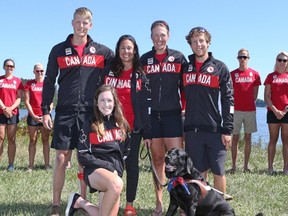 Canadian Paralympic para-rowers Kristen Kit, front, Sudbury's Curtis Halladay, Andrew Todd, Meghan Montgomery and Victoria Nolan, with her guide dog Alan, are introduced to members of the media at the Doug Wells Rowing Centre at Fanshawe Lake in London, Ont. on Tuesday July 26, 2016. The team won bronze Sunday at the Rio Paralympics. Craig Glover/Postmedia Network