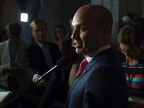 NDP MP Nathan Cullen speaks with the media following Question period Friday June 3, 2016 in Ottawa.  THE CANADIAN PRESS/Adrian Wyld