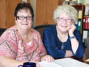 Judi Burrill, left, executive director of Kingston CMHA, and Brenda Miller,  who will be facilitating the Mental Health First Aid course and is the former executive director of the Kingston branch of the CMHA. (Steph Crosier/The Whig-Standard)