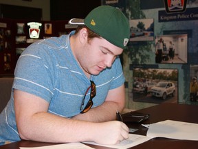 Liam Haigh, a police foundation student at St. Lawrence College, applies to become a community volunteer with Kingston Police. (Steph Crosier/The Whig-Standard)