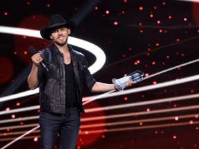 Brett Kissel accepts the fan choice award at the Canadian Country Music Association Awards at Budweiser Gardens in London, Ont. on Sunday September 11, 2016. Craig Glover/The London Free Press/Postmedia Network