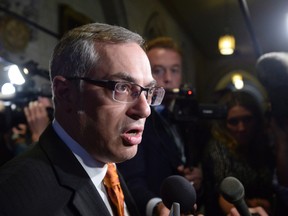 Conservative leadership candidate Tony Clement says if people at high risk of committing terrorist acts cannot be monitored around the clock, they should be behind bars. (THE CANADIAN PRESS/Files/Adrian Wyld)