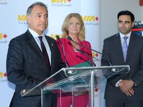 Yves Desjardins-Siciliano, President and CEO of VIA Rail Canada, left, announces infrastructure improvements at their stations in London and Sarnia during a press conference at the London VIA Rail station on Monday September 12, 2016. At right are London MPs Kate Young and Peter Fragiskatos. (MORRIS LAMONT, The London Free Press)