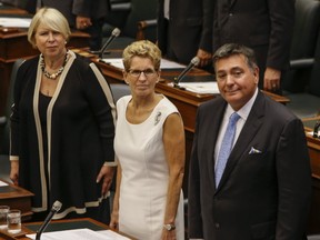Ontario Premier Kathleen Wynne with Deputy Premier Deb Matthews, left,  and Finance Minister Charles Sousa at Queen's Park on Sept. 12, 2016 at the throne speech. (Dave Thomas/Toronto Sun)