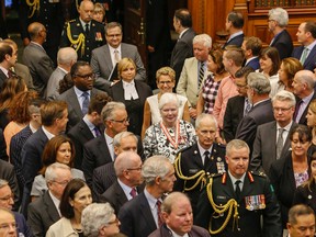 Ontario Premier Kathleen Wynne enters the legislature behind Lt.-Gov. Elizabeth Dowdeswell at Queen's Park for the reading of the throne speech on Monday, September 12, 2016. (Dave Thomas/Toronto Sun)