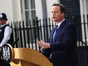 In this Wednesday, July 13, 2016 file photo,  Britain's Prime Minister David Cameron speaks to the media as he leaves 10 Downing Street, in London, after formally resigning as prime minister . Cameron announced Monday Sept. 12, 2016 that he will step down from his position as a Member of Parliament. Cameron’s unexpected announcement Monday will trigger a by-election for his seat in Oxfordshire England .﻿﻿ ﻿(AP Photo/Frank Augstein)