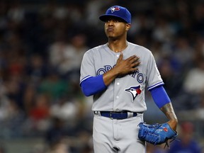 Toronto Blue Jays starting pitcher Marcus Stroman reacts during the fourth inning of a baseball game against the New York Yankees on Wednesday, Sept. 7, 2016, in New York. The Yankees won 2-0. (AP Photo/Adam Hunger)