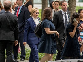 Democratic presidential candidate Hillary Clinton arrives to attend a ceremony at the National September 11 Memorial, in New York, Sunday, Sept. 11, 2016, on the 15th anniversary of the Sept. 11 attacks. (AP Photo/Andrew Harnik)