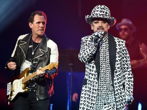 Guitarist Roy Hay (L) and singer Boy George of Culture Club perform last month in Las Vegas. The band will play MTS Centre in November. (Photo by Ethan Miller/Getty Images)