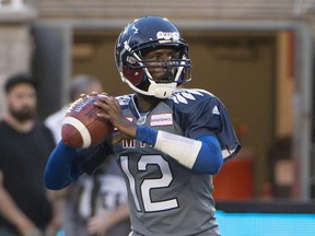 Montreal Alouettes quarterback Rakeem Cato searches downfield for a receiver during CFL action in Montreal on July 15, 2016. (THE CANADIAN PRESS/Peter McCabe)