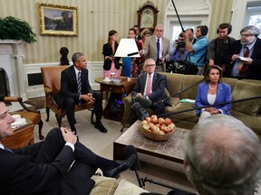 Speaker of the House Paul Ryan, R-Wis., left front, listens next to Senate Majority Leader Mitch McConnell, R-Ky., as President Barack Obama speaks next to Senate Democratic Leader Harry Reid, of Nevada, and House Democratic Leader Nancy Pelosi, of Calif., in the Oval Office of the White House, Monday, Sept. 12, 2016, in Washington. (AP Photo/Jacquelyn Martin)