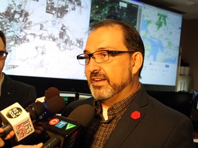Sudbury MPP and provincial energy minister Glenn Thibeault speaks to media in the control room at Greater Sudbury Utilities earlier this fall. (Ben Leeson/Sudbury Star file photo)