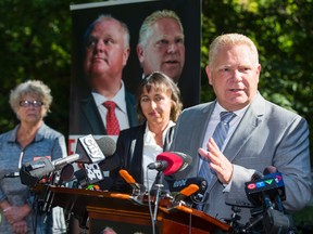 Doug Ford is joined by mother Diane and sister-in-law Renata as he announces the release of a new book about Ford Nation in the backyard of the Ford family home in Toronto on Tuesday September 13, 2016. (Ernest Doroszuk/Toronto Sun)