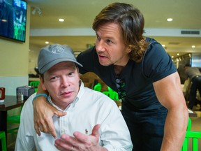 Chef Paul Wahlberg (left) and his brother actor Mark Wahlberg during an interview at Wahlburgers restaurant in downtown Toronto September 12, 2016. (Ernest Doroszuk/Toronto Sun)