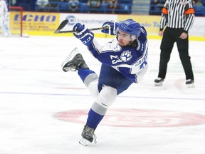 Sudbury Wolves veteran defenceman Kyle Capobianco gets a shot off during exhibition action  in Sudbury, Ont. on Friday September 9, 2016. John Lappa/Sudbury Star/Postmedia Network