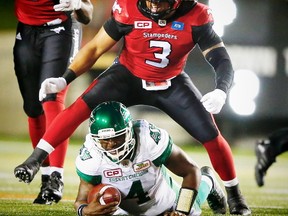 Taylor Reed, when he was still with the Stampeders, celebrates after bring down quarterback Darian Durant of the Saskatchewan Roughriders during CFL football in Calgary, Alta., on Thursday, August 4, 2016. AL CHAREST/POSTMEDIA