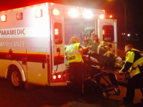 Paramedics help crash victim