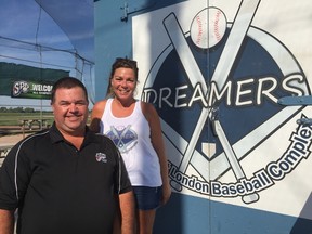 Chris Muscutt, president of Southwest London Adult Baseball, and Linda Eckert, general manager of Dreamers complex, remind adult slo-pitch players that they will still use Dreamers despite the first phase of a new development. (RANDY RICHMOND, The London Free Press)