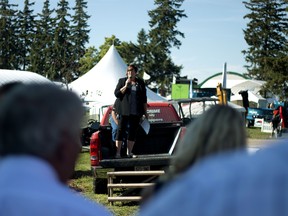 President of the Canadian 4-H council board of directors Donna Bridge speaks about 4-H Canada's new alumni program, Club 1913, during the opening ceremonies at Canada's Outdoor Farm Show on Tuesday. (BRUCE CHESSELL/Sentinel-Review)