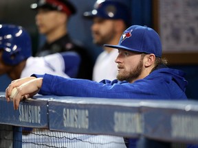 Josh Donaldson of the Toronto Blue Jays looks on from the top step of the dugout during MLB gme action against the Tampa Bay Rays on September 13, 2016 at the Rogers Centre. (Tom Szczerbowski/Getty Images)