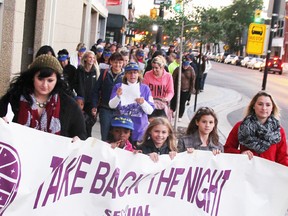 A group is shown in his file photo in downtown Sarnia during the 21st annual Take Back the Night march. The 23rd annual march is set for Thursday. (FILE PHOTO/ THE OBSERVER)