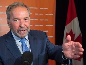 NDP leader Tom Mulcair addresses media prior to a caucus meeting Wednesday, September 14, 2016 in Montreal. THE CANADIAN PRESS/Paul Chiasson