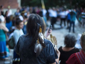 Sixties Scoop survivors and supporters gather for a demonstration at a courthouse on the day of a class-action court hearing in Toronto on Tuesday, August 23, 2016.Scores of aboriginals from across Ontario rallied in Toronto today ahead of a landmark court hearing on the so-called '60s Scoop. THE CANADIAN PRESS/Michelle Siu
