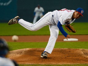 Ottawa Champions starting pitcher Daniel Cordero delivers to the plate against the Rockland Boulders during Game 2 of the Can-Am League final held at Raymond Chabot Grant Thornton field in Ottawa on Wednesday, Sept. 14, 2016. (James Park)