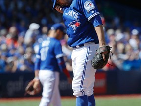 Blue Jays pitcher Marco Estrada reacts during his team's loss to the Tampa Bay Rays at the Rogers Centre in Toronto. on Sept. 14, 2016. (STAN BEHAL/Toronto Sun)