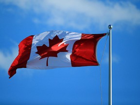 A Canada flag flies in the wind in Toronto, Ont., in this July 25, 2016 file photo. (Vaughn Ridley/Getty Images)