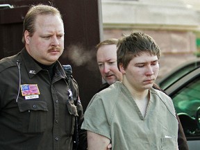 In this March 3, 2006, file photo, Brendan Dassey is escorted out of a Manitowoc County Circuit courtroom in Manitowoc, Wis. Attorneys for Dassey, who was convicted of helping his uncle kill a woman in a case profiled in the popular Netflix series "Making a Murderer," are asking for his release while his appeal is pending. A motion filed in federal court Wednesday, Sept. 14, 2016, argues that Dassey is not a flight risk and would not pose a danger to the public if he's released. (AP Photo/Morry Gash, File)