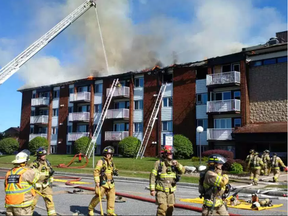 Ottawa firefighters assist at the scene of a major fire in Gatineau Thursday, September 15. (Scott Stillborn, Ottawa Fire Service)